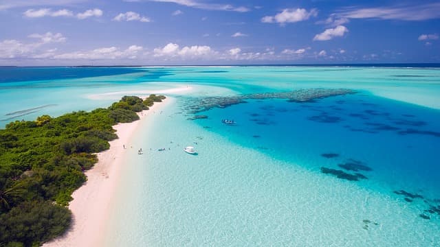 An overwater villa in the Maldives, one of our international destinations