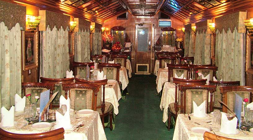 Ornate dining car aboard the Palace on Wheels with regal Rajput-inspired decor